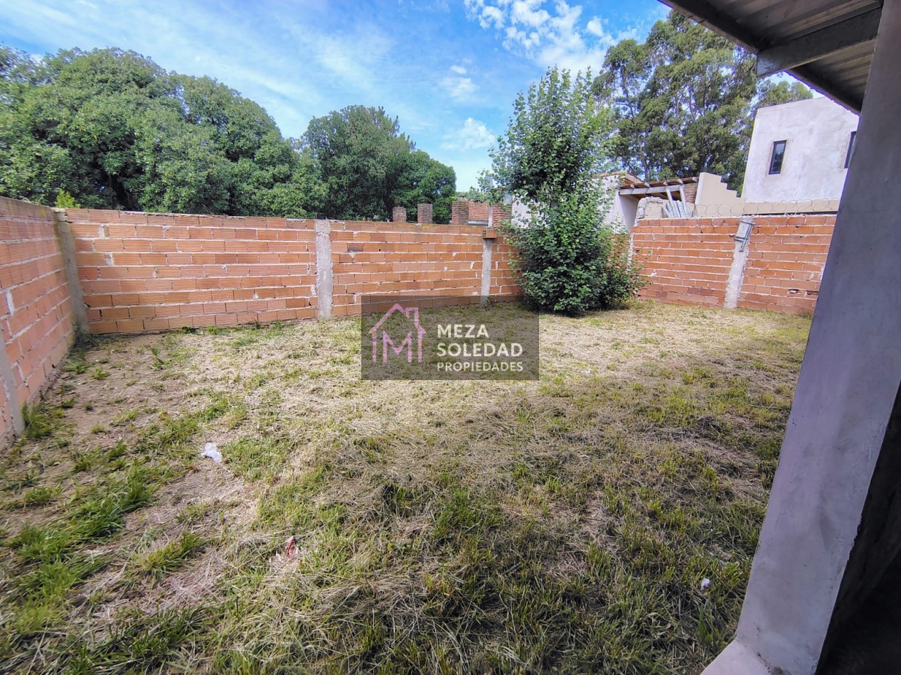 LOTE CON CONSTRUCCION A TERMINAR