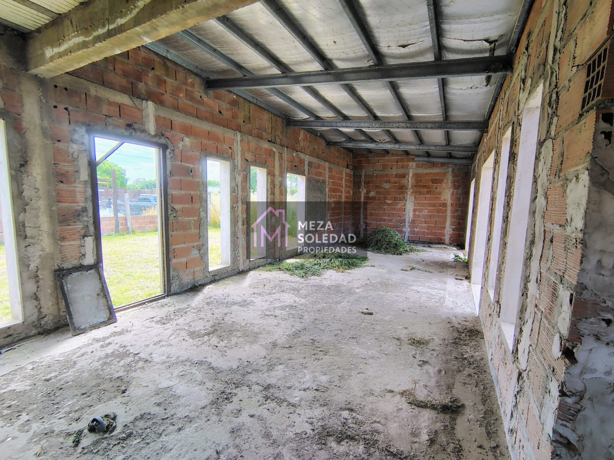 LOTE CON CONSTRUCCION A TERMINAR